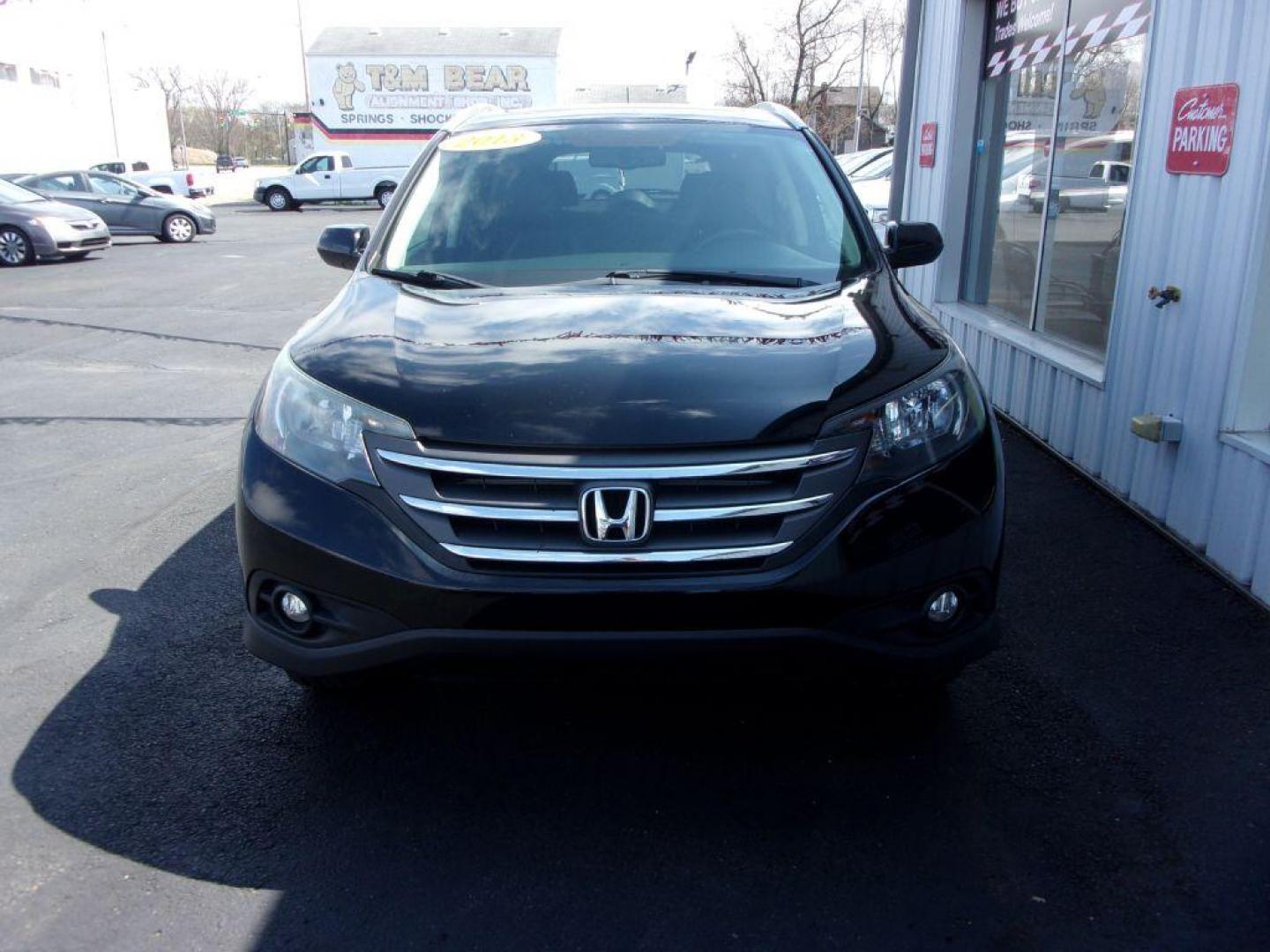 2013 BLACK HONDA CR-V EXL (2HKRM4H77DH) with an 2.4L engine, Automatic transmission, located at 501 E. Columbia St., Springfield, OH, 45503, (800) 262-7122, 39.925262, -83.801796 - ***Clean Carfax***AWD***EXL***Heated Leather Seating***Moonroof***Serviced and Detailed*** Jay North Auto has offered hand picked vehicles since 1965! Our customer's enjoy a NO pressure buying experience with a small town feel. All of our vehicles get fully inspected and detailed. We are a prefe - Photo#1