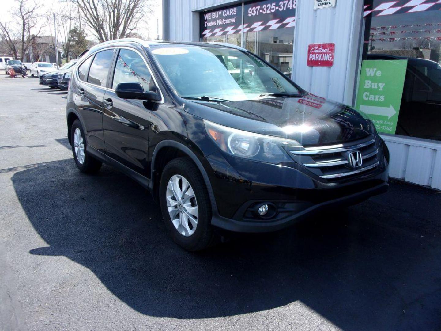 2013 BLACK HONDA CR-V EXL (2HKRM4H77DH) with an 2.4L engine, Automatic transmission, located at 501 E. Columbia St., Springfield, OH, 45503, (800) 262-7122, 39.925262, -83.801796 - ***Clean Carfax***AWD***EXL***Heated Leather Seating***Moonroof***Serviced and Detailed*** Jay North Auto has offered hand picked vehicles since 1965! Our customer's enjoy a NO pressure buying experience with a small town feel. All of our vehicles get fully inspected and detailed. We are a prefe - Photo#2