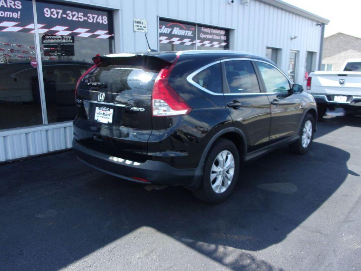 2013 BLACK HONDA CR-V EXL (2HKRM4H77DH) with an 2.4L engine, Automatic transmission, located at 501 E. Columbia St., Springfield, OH, 45503, (800) 262-7122, 39.925262, -83.801796 - ***Clean Carfax***AWD***EXL***Heated Leather Seating***Moonroof***Serviced and Detailed*** Jay North Auto has offered hand picked vehicles since 1965! Our customer's enjoy a NO pressure buying experience with a small town feel. All of our vehicles get fully inspected and detailed. We are a prefe - Photo#3