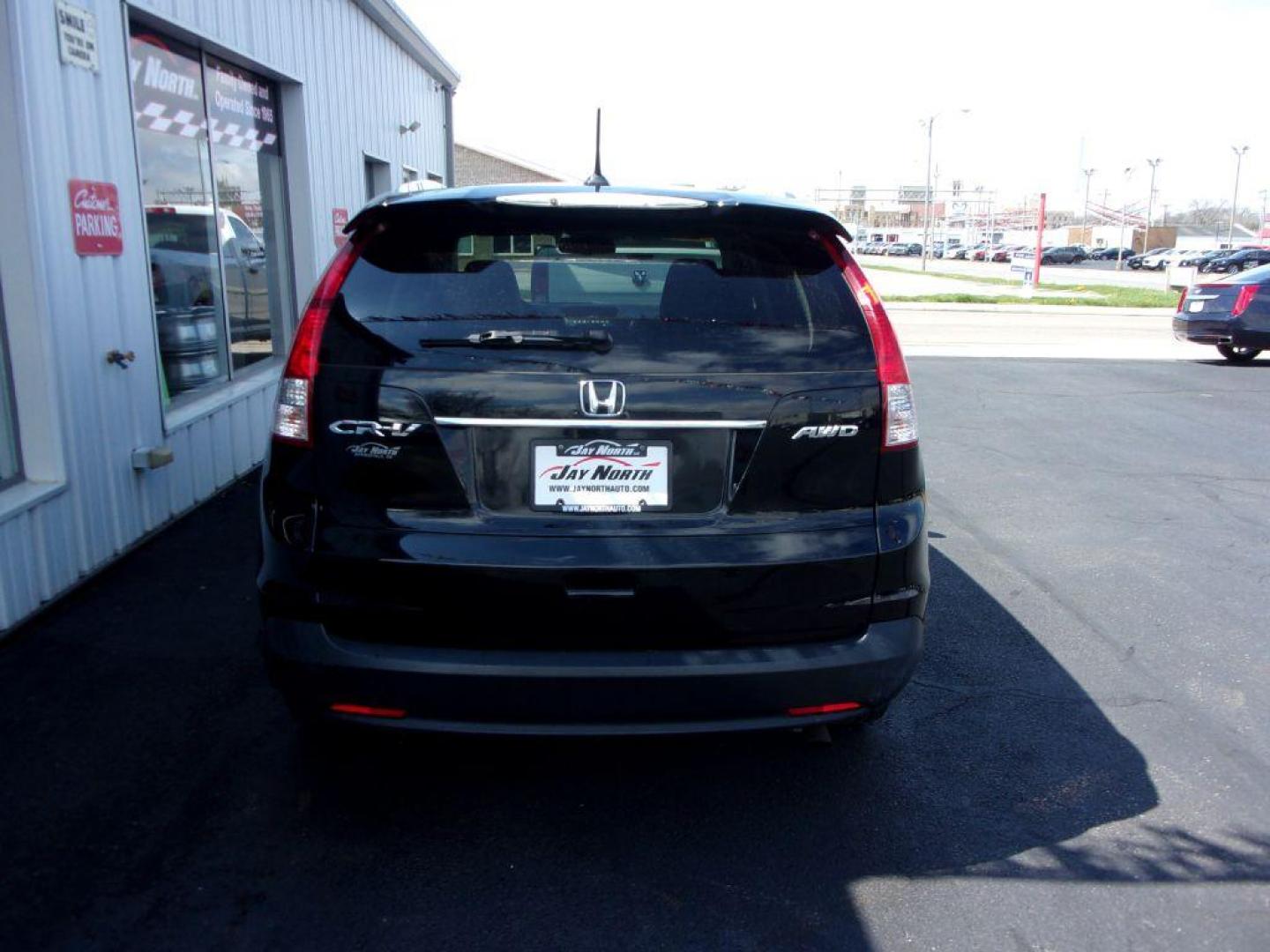 2013 BLACK HONDA CR-V EXL (2HKRM4H77DH) with an 2.4L engine, Automatic transmission, located at 501 E. Columbia St., Springfield, OH, 45503, (800) 262-7122, 39.925262, -83.801796 - ***Clean Carfax***AWD***EXL***Heated Leather Seating***Moonroof***Serviced and Detailed*** Jay North Auto has offered hand picked vehicles since 1965! Our customer's enjoy a NO pressure buying experience with a small town feel. All of our vehicles get fully inspected and detailed. We are a prefe - Photo#4