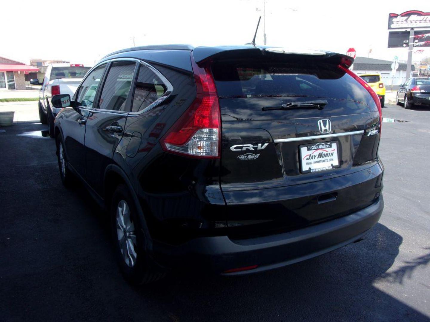 2013 BLACK HONDA CR-V EXL (2HKRM4H77DH) with an 2.4L engine, Automatic transmission, located at 501 E. Columbia St., Springfield, OH, 45503, (800) 262-7122, 39.925262, -83.801796 - ***Clean Carfax***AWD***EXL***Heated Leather Seating***Moonroof***Serviced and Detailed*** Jay North Auto has offered hand picked vehicles since 1965! Our customer's enjoy a NO pressure buying experience with a small town feel. All of our vehicles get fully inspected and detailed. We are a prefe - Photo#5