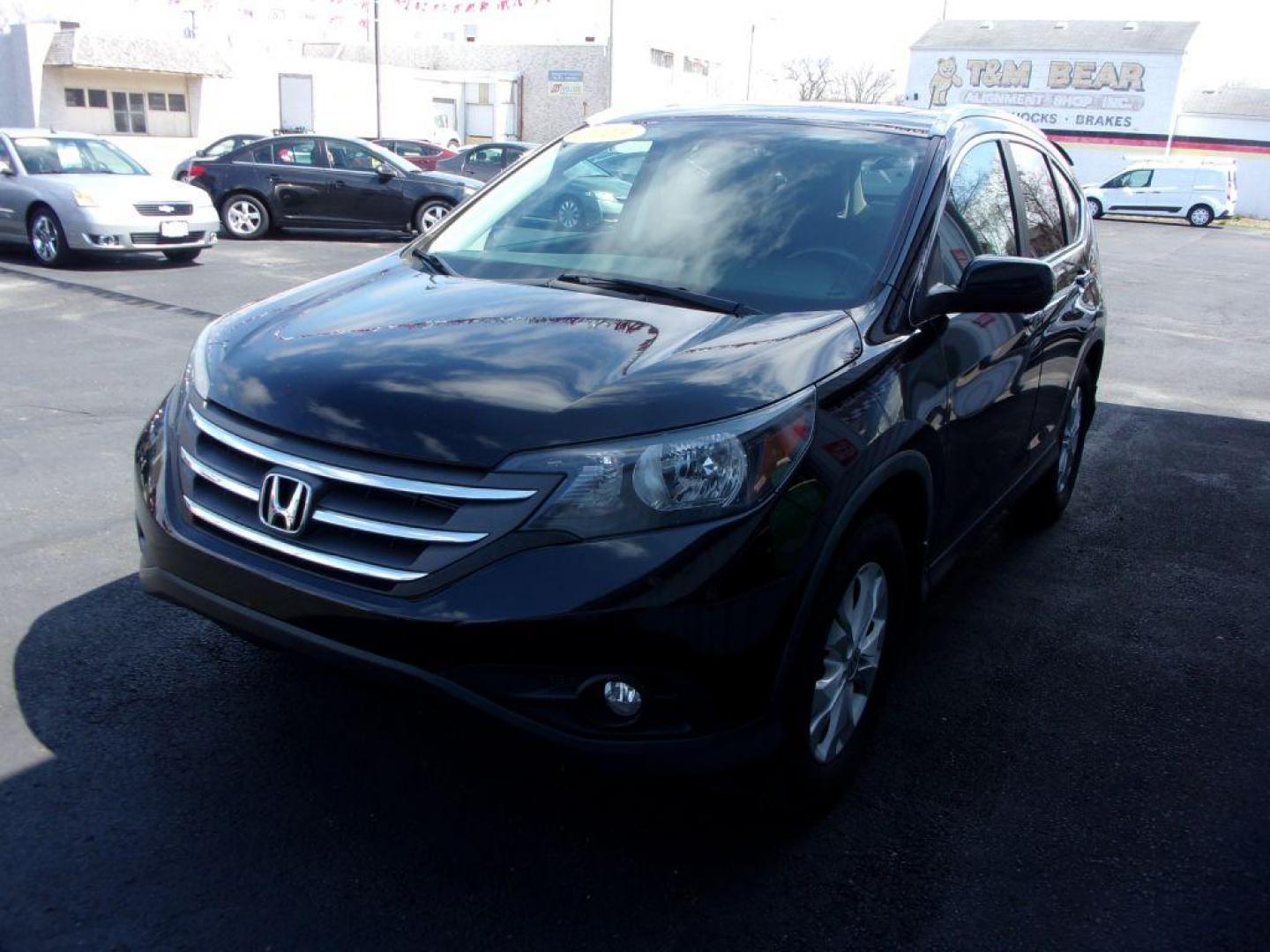 2013 BLACK HONDA CR-V EXL (2HKRM4H77DH) with an 2.4L engine, Automatic transmission, located at 501 E. Columbia St., Springfield, OH, 45503, (800) 262-7122, 39.925262, -83.801796 - ***Clean Carfax***AWD***EXL***Heated Leather Seating***Moonroof***Serviced and Detailed*** Jay North Auto has offered hand picked vehicles since 1965! Our customer's enjoy a NO pressure buying experience with a small town feel. All of our vehicles get fully inspected and detailed. We are a prefe - Photo#6