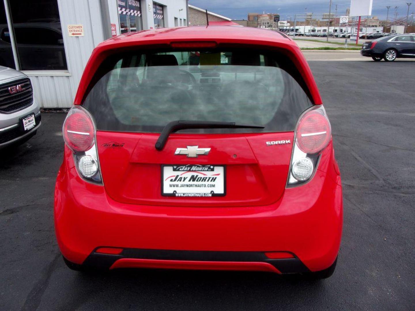 2015 RED CHEVROLET SPARK LS (KL8CB6S95FC) with an 1.2L engine, Continuously Variable transmission, located at 501 E. Columbia St., Springfield, OH, 45503, (800) 262-7122, 39.925262, -83.801796 - Photo#4