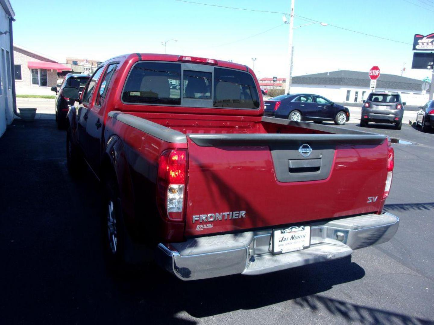 2015 RED NISSAN FRONTIER CREW CAB SV (1N6AD0EV4FN) with an 4.0L engine, Automatic transmission, located at 501 E. Columbia St., Springfield, OH, 45503, (800) 262-7122, 39.925262, -83.801796 - Photo#4