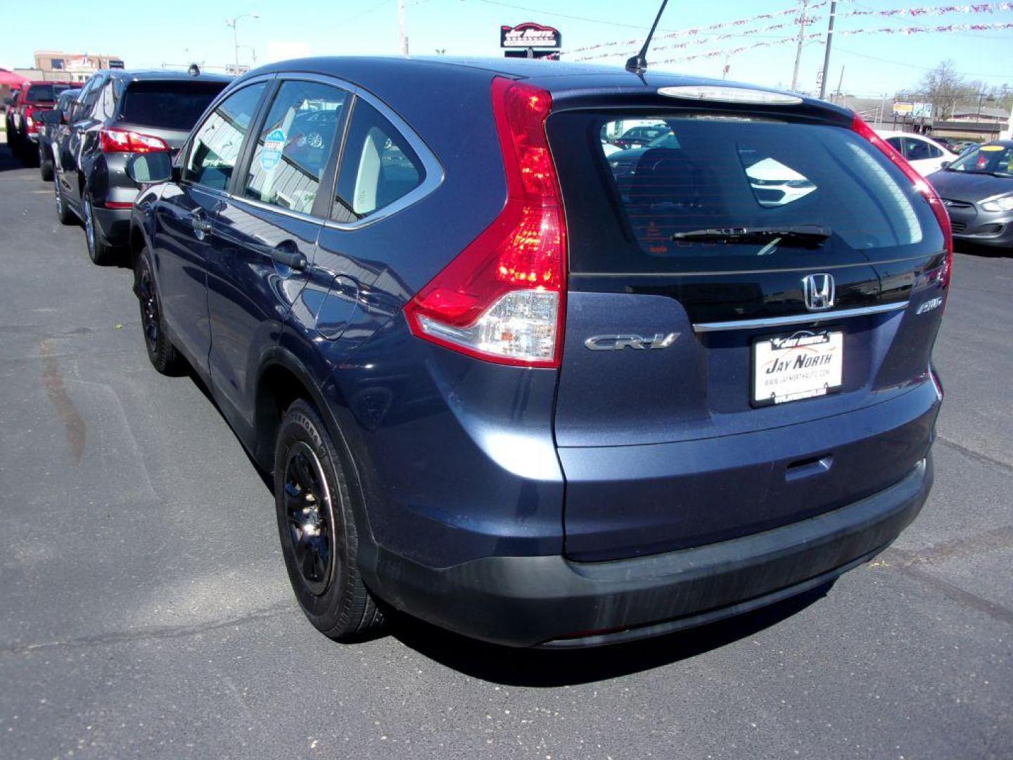 2014 BLUE HONDA CR-V LX (2HKRM4H33EH) with an 2.4L engine, Automatic transmission, located at 501 E. Columbia St., Springfield, OH, 45503, (800) 262-7122, 39.925262, -83.801796 - *** Updated Timing *** Serviced and Detailed *** LX *** AWD *** Jay North Auto has offered hand picked vehicles since 1965! Our customer's enjoy a NO pressure buying experience with a small town feel. All of our vehicles get fully inspected and detailed. We are a preferred dealer for many local - Photo#2