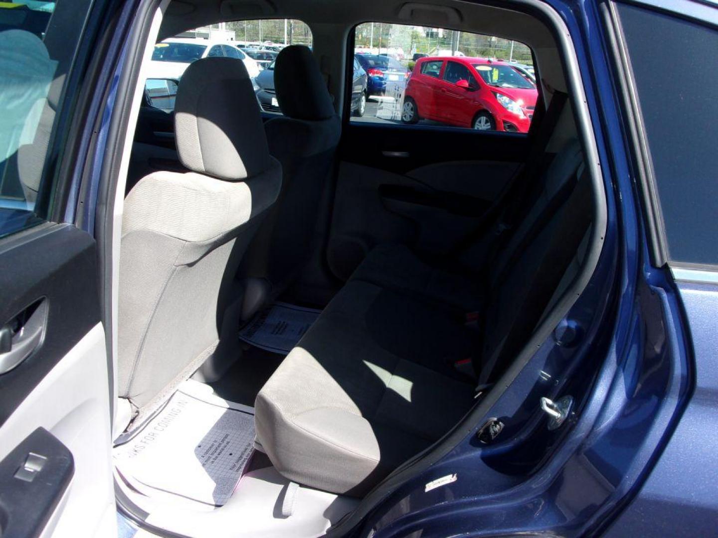 2014 BLUE HONDA CR-V LX (2HKRM4H33EH) with an 2.4L engine, Automatic transmission, located at 501 E. Columbia St., Springfield, OH, 45503, (800) 262-7122, 39.925262, -83.801796 - *** Updated Timing *** Serviced and Detailed *** LX *** AWD *** Jay North Auto has offered hand picked vehicles since 1965! Our customer's enjoy a NO pressure buying experience with a small town feel. All of our vehicles get fully inspected and detailed. We are a preferred dealer for many local - Photo#5