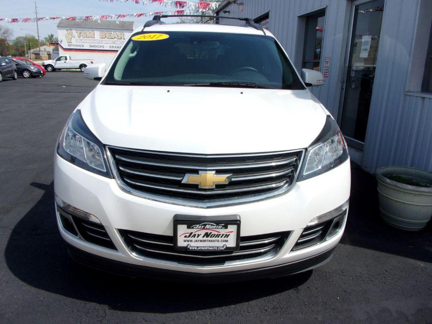 2017 WHITE CHEVROLET TRAVERSE PREMIER (1GNKVJKD4HJ) with an 3.6L engine, Automatic transmission, located at 501 E. Columbia St., Springfield, OH, 45503, (800) 262-7122, 39.925262, -83.801796 - ***Clean Carfax***LOADED***Heated and Cooled Leather Seating***AWD***3RD Row seating***PREMIER***Serviced and Detailed*** Jay North Auto has offered hand picked vehicles since 1965! Our customer's enjoy a NO pressure buying experience with a small town feel. All of our vehicles get fully inspect - Photo#2