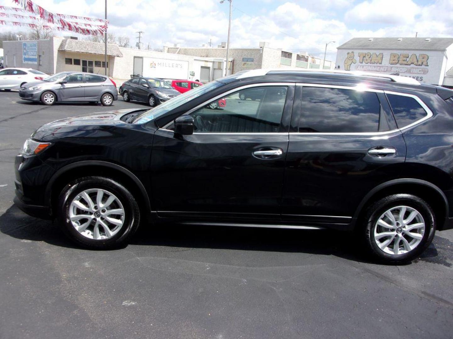 2018 BLACK NISSAN ROGUE SV (JN8AT2MV0JW) with an 2.5L engine, Continuously Variable transmission, located at 501 E. Columbia St., Springfield, OH, 45503, (800) 262-7122, 39.925262, -83.801796 - *** SV *** AWD *** Serviced and Detailed *** Back Up Camera *** NICE! *** Power Lift Gate *** Heated Seats *** Jay North Auto has offered hand picked vehicles since 1965! Our customer's enjoy a NO pressure buying experience with a small town feel. All of our vehicles get fully inspected and deta - Photo#3