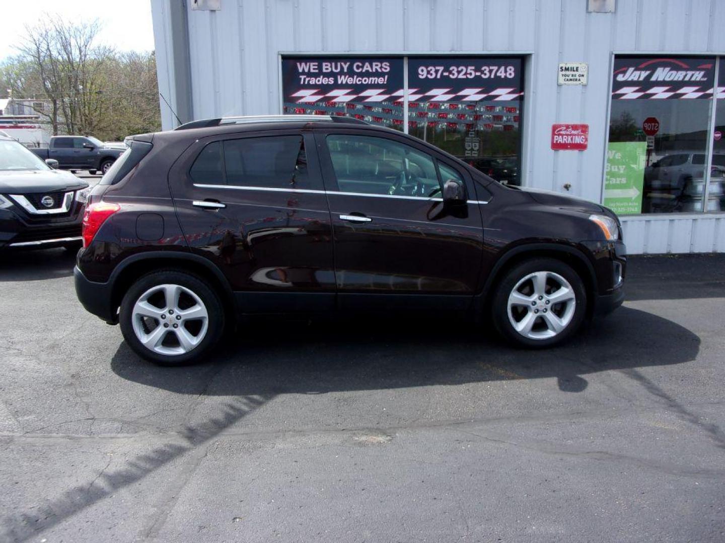 2015 BROWN CHEVROLET TRAX LTZ (KL7CJNSB5FB) with an 1.4L engine, Automatic transmission, located at 501 E. Columbia St., Springfield, OH, 45503, (800) 262-7122, 39.925262, -83.801796 - ***LTZ***Heated Leather Seating***My Link***BOSE Premium Audio***Sunroof***Serviced and Detailed*** Jay North Auto has offered hand picked vehicles since 1965! Our customer's enjoy a NO pressure buying experience with a small town feel. All of our vehicles get fully inspected and detailed. We ar - Photo#0