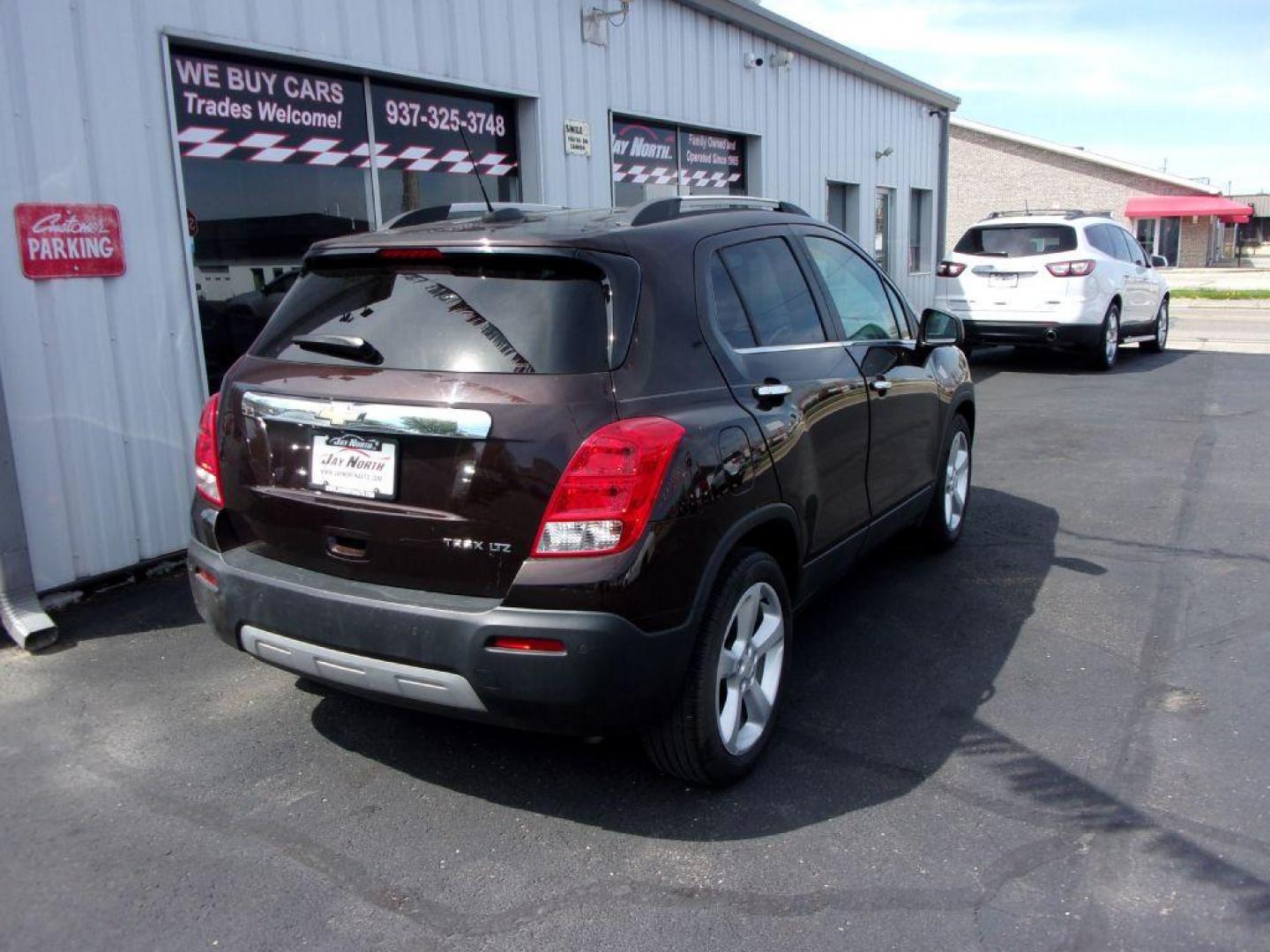 2015 BROWN CHEVROLET TRAX LTZ (KL7CJNSB5FB) with an 1.4L engine, Automatic transmission, located at 501 E. Columbia St., Springfield, OH, 45503, (800) 262-7122, 39.925262, -83.801796 - ***LTZ***Heated Leather Seating***My Link***BOSE Premium Audio***Sunroof***Serviced and Detailed*** Jay North Auto has offered hand picked vehicles since 1965! Our customer's enjoy a NO pressure buying experience with a small town feel. All of our vehicles get fully inspected and detailed. We ar - Photo#3