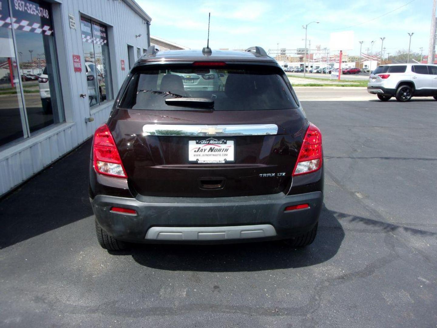 2015 BROWN CHEVROLET TRAX LTZ (KL7CJNSB5FB) with an 1.4L engine, Automatic transmission, located at 501 E. Columbia St., Springfield, OH, 45503, (800) 262-7122, 39.925262, -83.801796 - ***LTZ***Heated Leather Seating***My Link***BOSE Premium Audio***Sunroof***Serviced and Detailed*** Jay North Auto has offered hand picked vehicles since 1965! Our customer's enjoy a NO pressure buying experience with a small town feel. All of our vehicles get fully inspected and detailed. We ar - Photo#4