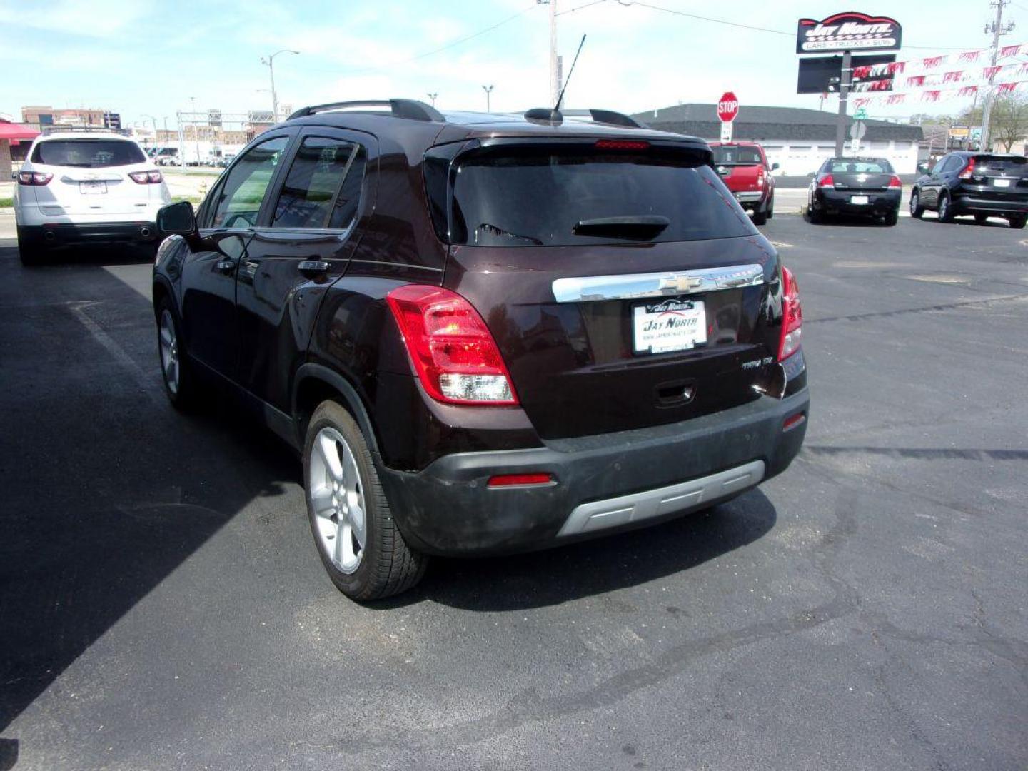 2015 BROWN CHEVROLET TRAX LTZ (KL7CJNSB5FB) with an 1.4L engine, Automatic transmission, located at 501 E. Columbia St., Springfield, OH, 45503, (800) 262-7122, 39.925262, -83.801796 - ***LTZ***Heated Leather Seating***My Link***BOSE Premium Audio***Sunroof***Serviced and Detailed*** Jay North Auto has offered hand picked vehicles since 1965! Our customer's enjoy a NO pressure buying experience with a small town feel. All of our vehicles get fully inspected and detailed. We ar - Photo#5