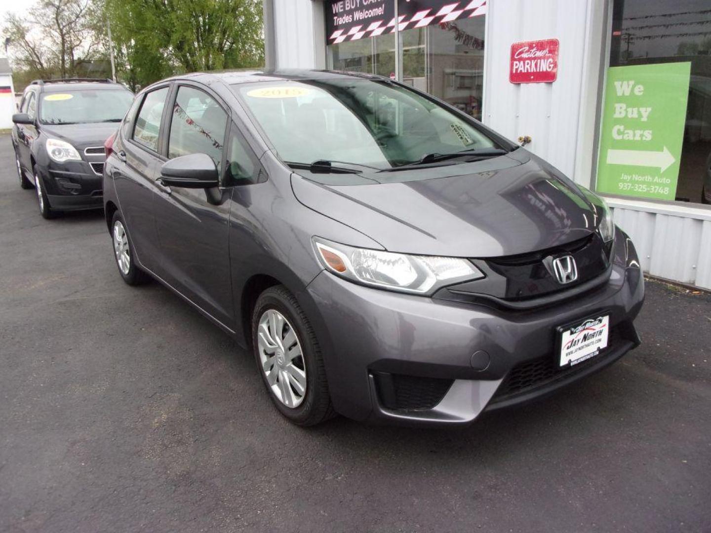 2015 GRAY HONDA FIT LX (3HGGK5G58FM) with an 1.5L engine, Manual transmission, located at 501 E. Columbia St., Springfield, OH, 45503, (800) 262-7122, 39.925262, -83.801796 - ***Clean Carfax***Updated Timing***LX***6-Speed***Serviced and Detailed*** Jay North Auto has offered hand picked vehicles since 1965! Our customer's enjoy a NO pressure buying experience with a small town feel. All of our vehicles get fully inspected and detailed. We are a preferred dealer for - Photo#2