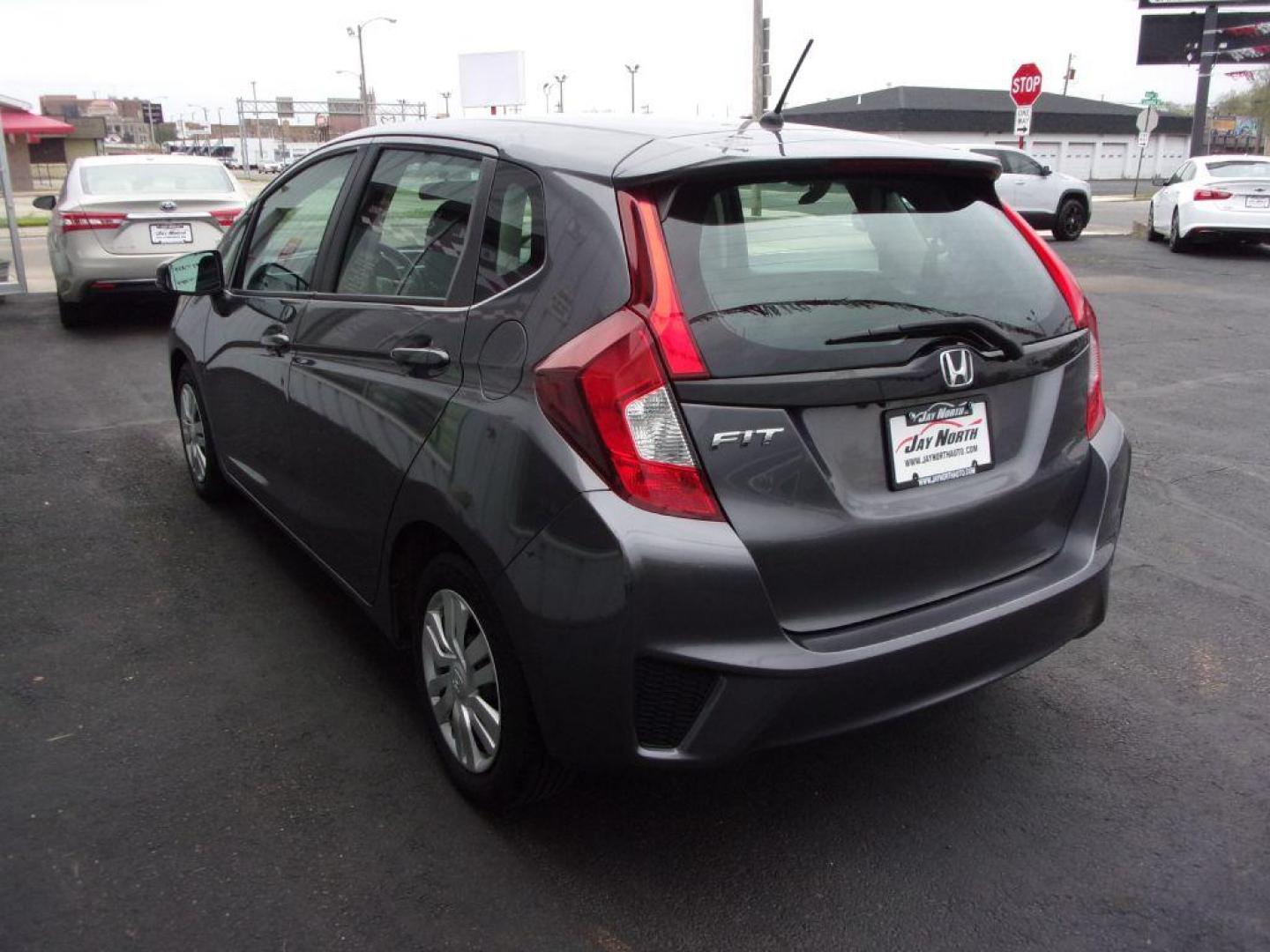 2015 GRAY HONDA FIT LX (3HGGK5G58FM) with an 1.5L engine, Manual transmission, located at 501 E. Columbia St., Springfield, OH, 45503, (800) 262-7122, 39.925262, -83.801796 - ***Clean Carfax***Updated Timing***LX***6-Speed***Serviced and Detailed*** Jay North Auto has offered hand picked vehicles since 1965! Our customer's enjoy a NO pressure buying experience with a small town feel. All of our vehicles get fully inspected and detailed. We are a preferred dealer for - Photo#5