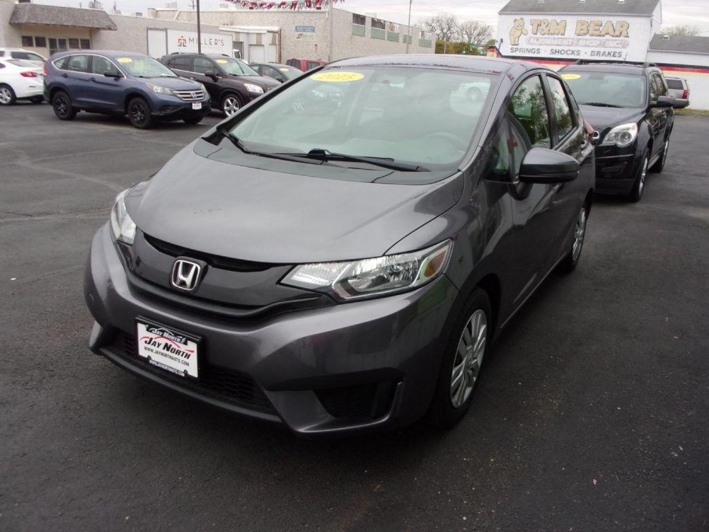 2015 GRAY HONDA FIT LX (3HGGK5G58FM) with an 1.5L engine, Manual transmission, located at 501 E. Columbia St., Springfield, OH, 45503, (800) 262-7122, 39.925262, -83.801796 - ***Clean Carfax***Updated Timing***LX***6-Speed***Serviced and Detailed*** Jay North Auto has offered hand picked vehicles since 1965! Our customer's enjoy a NO pressure buying experience with a small town feel. All of our vehicles get fully inspected and detailed. We are a preferred dealer for - Photo#6