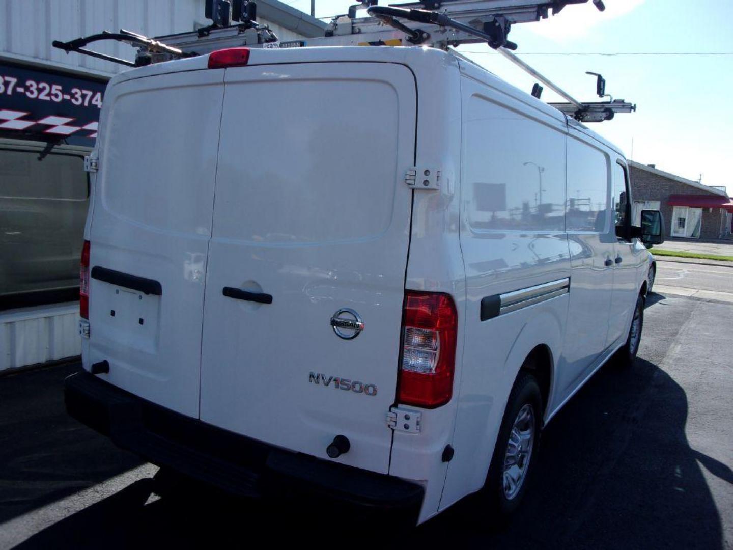 2019 WHITE NISSAN NV 1500 S CARGO (1N6BF0KM1KN) with an 4.0L engine, Automatic transmission, located at 501 E. Columbia St., Springfield, OH, 45503, (800) 262-7122, 39.925262, -83.801796 - *** Racks and Bins *** Serviced and Detailed *** 4.0L *** Navigation Package *** Back Up Sensors *** Cruise Control *** Tilt *** Priced below market *** Jay North Auto has offered hand picked vehicles since 1965! Our customer's enjoy a NO pressure buying experience with a small town feel. All o - Photo#9