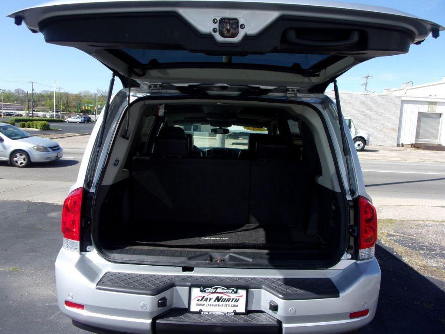 2013 SILVER NISSAN ARMADA PLATINUM (5N1BA0NE8DN) with an 5.6L engine, Automatic transmission, located at 501 E. Columbia St., Springfield, OH, 45503, (800) 262-7122, 39.925262, -83.801796 - *** 1 Owner *** Serviced and Detailed *** Platinum *** Bose Audio *** Third Row Seat *** Moonroof *** Leather *** 4WD *** V8 *** Loaded *** 31 Service Records on CarFax *** Jay North Auto has offered hand picked vehicles since 1965! Our customer's enjoy a NO pressure buying experience with a sm - Photo#8