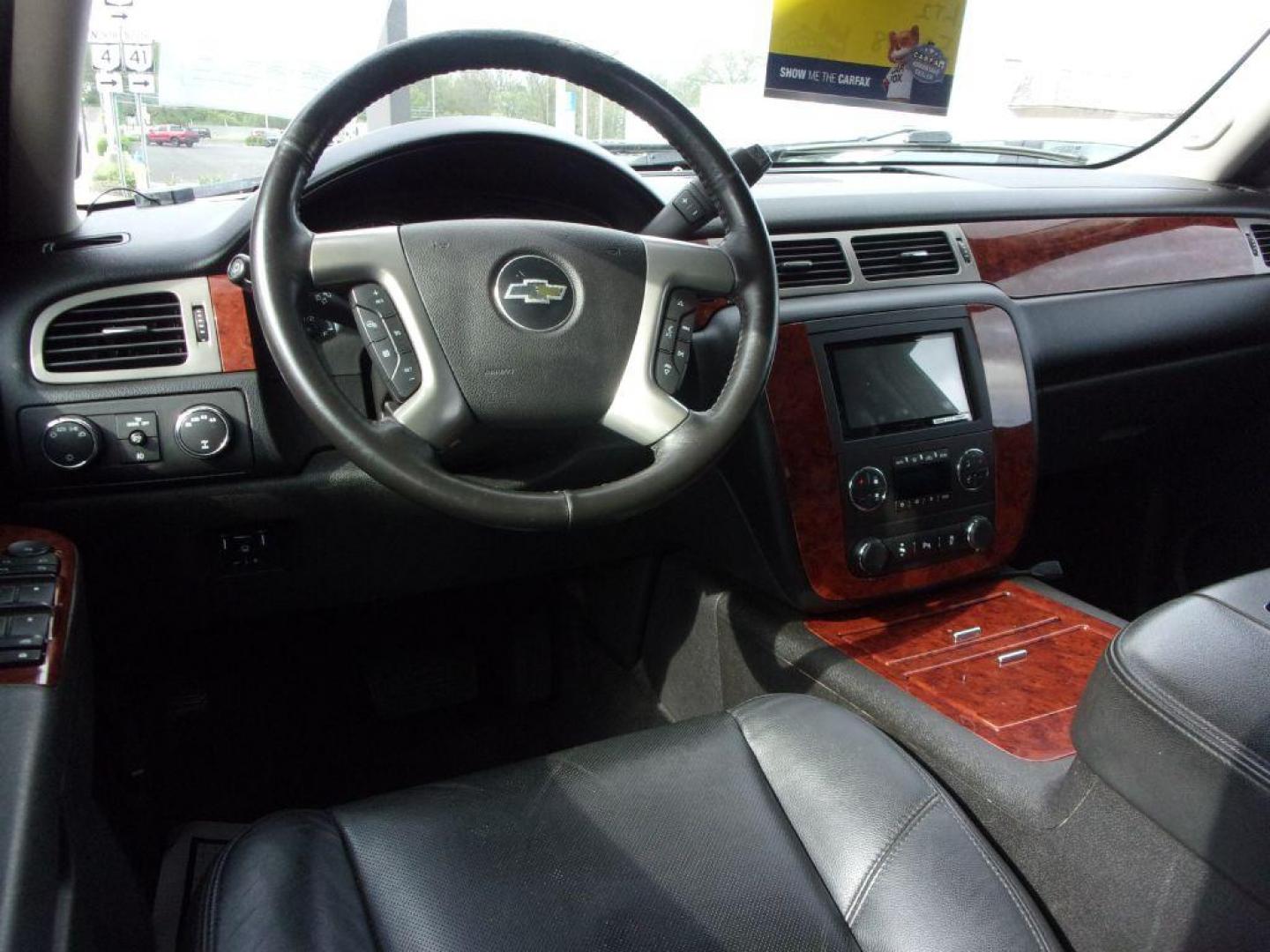 2013 RED CHEVROLET TAHOE 1500 LTZ (1GNSKCE08DR) with an 5.3L engine, Automatic transmission, located at 501 E. Columbia St., Springfield, OH, 45503, (800) 262-7122, 39.925262, -83.801796 - *** LTZ *** Serviced and Detailed *** Heated and Cooled Leather Seating *** Third Row Seating *** Moonroof *** Pioneer Audio **8 Premium Wheels *** LOADED *** Rides and Drives Great *** 5.3L V8 4x4 *** Jay North Auto has offered hand picked vehicles since 1965! Our customer's enjoy a NO pressure - Photo#13