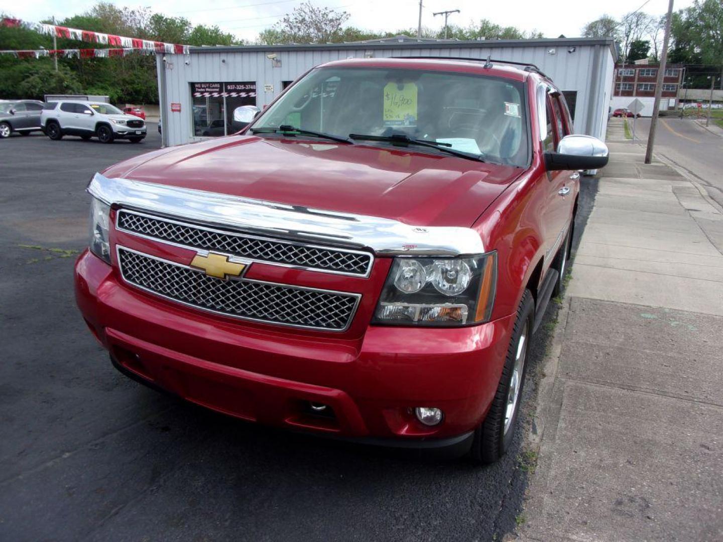 2013 RED CHEVROLET TAHOE 1500 LTZ (1GNSKCE08DR) with an 5.3L engine, Automatic transmission, located at 501 E. Columbia St., Springfield, OH, 45503, (800) 262-7122, 39.925262, -83.801796 - *** LTZ *** Serviced and Detailed *** Heated and Cooled Leather Seating *** Third Row Seating *** Moonroof *** Pioneer Audio **8 Premium Wheels *** LOADED *** Rides and Drives Great *** 5.3L V8 4x4 *** Jay North Auto has offered hand picked vehicles since 1965! Our customer's enjoy a NO pressure - Photo#1