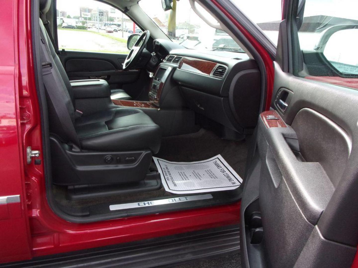 2013 RED CHEVROLET TAHOE 1500 LTZ (1GNSKCE08DR) with an 5.3L engine, Automatic transmission, located at 501 E. Columbia St., Springfield, OH, 45503, (800) 262-7122, 39.925262, -83.801796 - *** LTZ *** Serviced and Detailed *** Heated and Cooled Leather Seating *** Third Row Seating *** Moonroof *** Pioneer Audio **8 Premium Wheels *** LOADED *** Rides and Drives Great *** 5.3L V8 4x4 *** Jay North Auto has offered hand picked vehicles since 1965! Our customer's enjoy a NO pressure - Photo#23