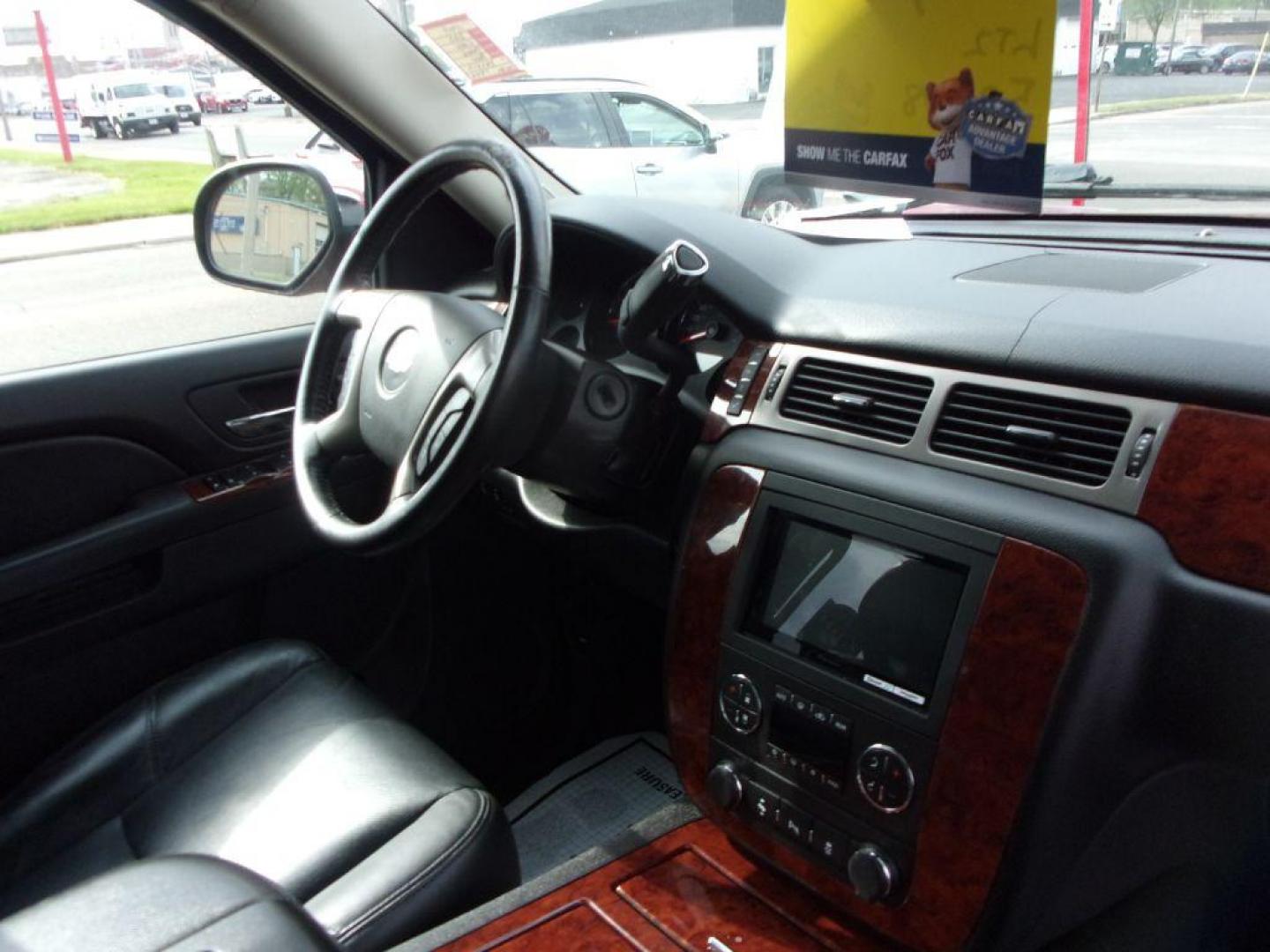 2013 RED CHEVROLET TAHOE 1500 LTZ (1GNSKCE08DR) with an 5.3L engine, Automatic transmission, located at 501 E. Columbia St., Springfield, OH, 45503, (800) 262-7122, 39.925262, -83.801796 - *** LTZ *** Serviced and Detailed *** Heated and Cooled Leather Seating *** Third Row Seating *** Moonroof *** Pioneer Audio **8 Premium Wheels *** LOADED *** Rides and Drives Great *** 5.3L V8 4x4 *** Jay North Auto has offered hand picked vehicles since 1965! Our customer's enjoy a NO pressure - Photo#25