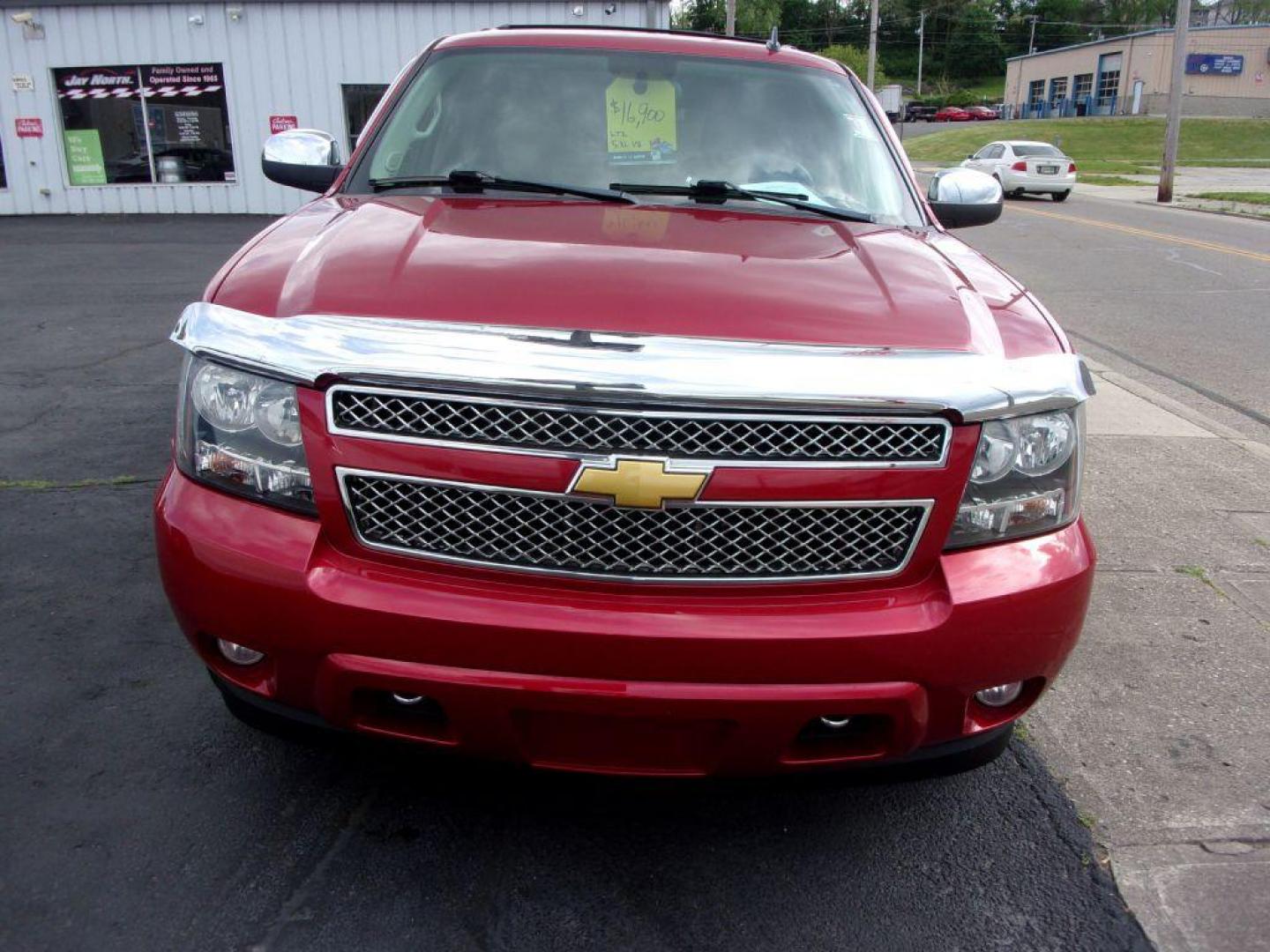 2013 RED CHEVROLET TAHOE 1500 LTZ (1GNSKCE08DR) with an 5.3L engine, Automatic transmission, located at 501 E. Columbia St., Springfield, OH, 45503, (800) 262-7122, 39.925262, -83.801796 - *** LTZ *** Serviced and Detailed *** Heated and Cooled Leather Seating *** Third Row Seating *** Moonroof *** Pioneer Audio **8 Premium Wheels *** LOADED *** Rides and Drives Great *** 5.3L V8 4x4 *** Jay North Auto has offered hand picked vehicles since 1965! Our customer's enjoy a NO pressure - Photo#2