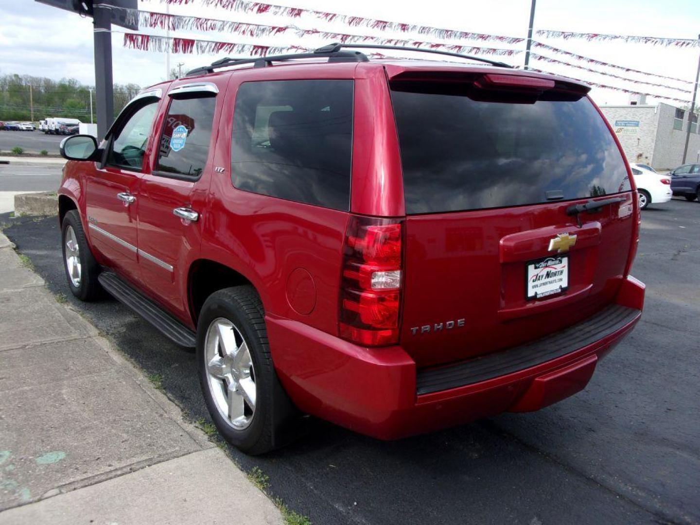 2013 RED CHEVROLET TAHOE 1500 LTZ (1GNSKCE08DR) with an 5.3L engine, Automatic transmission, located at 501 E. Columbia St., Springfield, OH, 45503, (800) 262-7122, 39.925262, -83.801796 - *** LTZ *** Serviced and Detailed *** Heated and Cooled Leather Seating *** Third Row Seating *** Moonroof *** Pioneer Audio **8 Premium Wheels *** LOADED *** Rides and Drives Great *** 5.3L V8 4x4 *** Jay North Auto has offered hand picked vehicles since 1965! Our customer's enjoy a NO pressure - Photo#4