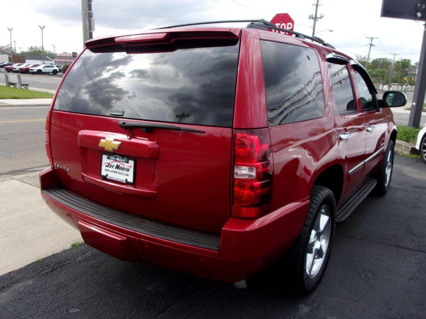 2013 RED CHEVROLET TAHOE 1500 LTZ (1GNSKCE08DR) with an 5.3L engine, Automatic transmission, located at 501 E. Columbia St., Springfield, OH, 45503, (800) 262-7122, 39.925262, -83.801796 - *** LTZ *** Serviced and Detailed *** Heated and Cooled Leather Seating *** Third Row Seating *** Moonroof *** Pioneer Audio **8 Premium Wheels *** LOADED *** Rides and Drives Great *** 5.3L V8 4x4 *** Jay North Auto has offered hand picked vehicles since 1965! Our customer's enjoy a NO pressure - Photo#6