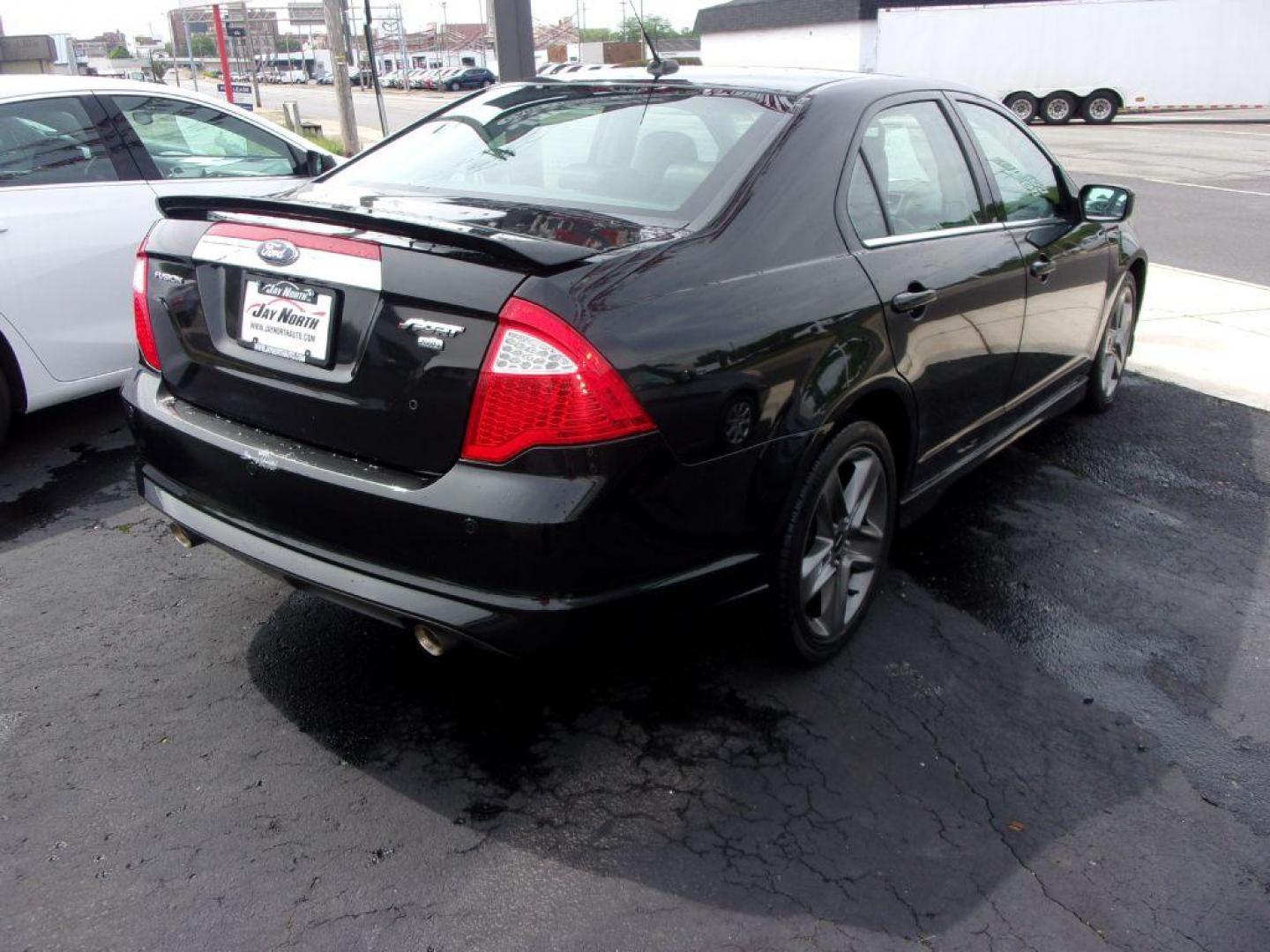 2010 BLACK FORD FUSION SPORT (3FAHP0DC9AR) with an 3.5L engine, Automatic transmission, located at 501 E. Columbia St., Springfield, OH, 45503, (800) 262-7122, 39.925262, -83.801796 - *** Sport *** V6 AWD *** Serviced and Detailed *** Leather *** Sony Navigation *** Moonroof *** Loaded *** Jay North Auto has offered hand picked vehicles since 1965! Our customer's enjoy a NO pressure buying experience with a small town feel. All of our vehicles get fully inspected and detailed - Photo#2