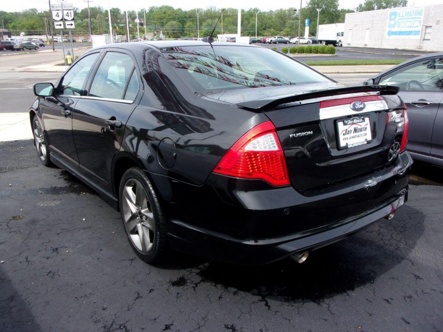 2010 BLACK FORD FUSION SPORT (3FAHP0DC9AR) with an 3.5L engine, Automatic transmission, located at 501 E. Columbia St., Springfield, OH, 45503, (800) 262-7122, 39.925262, -83.801796 - *** Sport *** V6 AWD *** Serviced and Detailed *** Leather *** Sony Navigation *** Moonroof *** Loaded *** Jay North Auto has offered hand picked vehicles since 1965! Our customer's enjoy a NO pressure buying experience with a small town feel. All of our vehicles get fully inspected and detailed - Photo#3