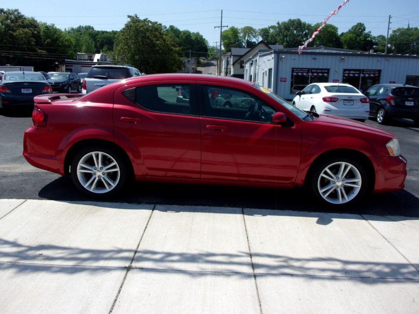 2012 RED DODGE AVENGER SXT (1C3CDZCB0CN) with an 2.4L engine, Automatic transmission, located at 501 E. Columbia St., Springfield, OH, 45503, (800) 262-7122, 39.925262, -83.801796 - ***SXT***Leather Seating***New Brakes***Serviced and Detailed*** Jay North Auto has offered hand picked vehicles since 1965! Our customer's enjoy a NO pressure buying experience with a small town feel. All of our vehicles get fully inspected and detailed. We are a preferred dealer for many local - Photo#0