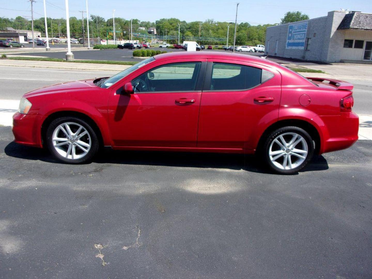 2012 RED DODGE AVENGER SXT (1C3CDZCB0CN) with an 2.4L engine, Automatic transmission, located at 501 E. Columbia St., Springfield, OH, 45503, (800) 262-7122, 39.925262, -83.801796 - ***SXT***Leather Seating***New Brakes***Serviced and Detailed*** Jay North Auto has offered hand picked vehicles since 1965! Our customer's enjoy a NO pressure buying experience with a small town feel. All of our vehicles get fully inspected and detailed. We are a preferred dealer for many local - Photo#1