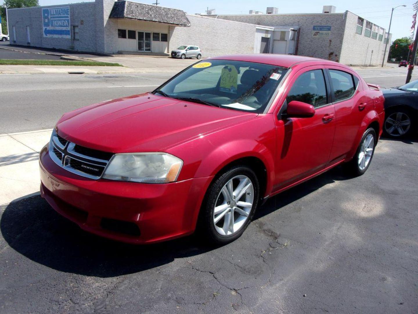 2012 RED DODGE AVENGER SXT (1C3CDZCB0CN) with an 2.4L engine, Automatic transmission, located at 501 E. Columbia St., Springfield, OH, 45503, (800) 262-7122, 39.925262, -83.801796 - ***SXT***Leather Seating***New Brakes***Serviced and Detailed*** Jay North Auto has offered hand picked vehicles since 1965! Our customer's enjoy a NO pressure buying experience with a small town feel. All of our vehicles get fully inspected and detailed. We are a preferred dealer for many local - Photo#2