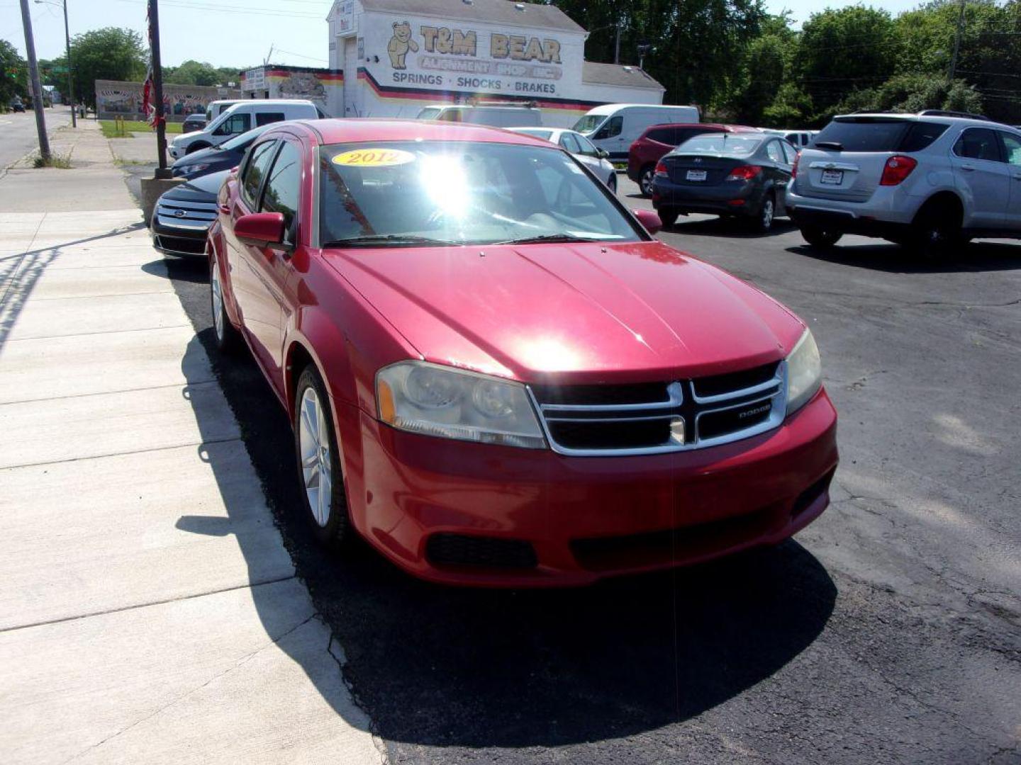 2012 RED DODGE AVENGER SXT (1C3CDZCB0CN) with an 2.4L engine, Automatic transmission, located at 501 E. Columbia St., Springfield, OH, 45503, (800) 262-7122, 39.925262, -83.801796 - ***SXT***Leather Seating***New Brakes***Serviced and Detailed*** Jay North Auto has offered hand picked vehicles since 1965! Our customer's enjoy a NO pressure buying experience with a small town feel. All of our vehicles get fully inspected and detailed. We are a preferred dealer for many local - Photo#3