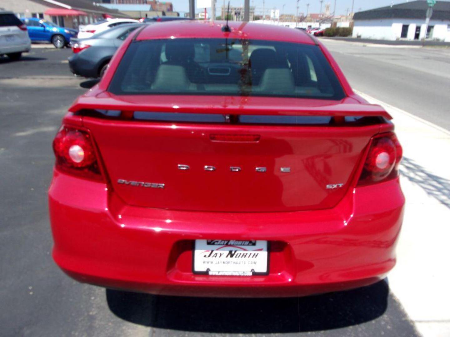 2012 RED DODGE AVENGER SXT (1C3CDZCB0CN) with an 2.4L engine, Automatic transmission, located at 501 E. Columbia St., Springfield, OH, 45503, (800) 262-7122, 39.925262, -83.801796 - ***SXT***Leather Seating***New Brakes***Serviced and Detailed*** Jay North Auto has offered hand picked vehicles since 1965! Our customer's enjoy a NO pressure buying experience with a small town feel. All of our vehicles get fully inspected and detailed. We are a preferred dealer for many local - Photo#5