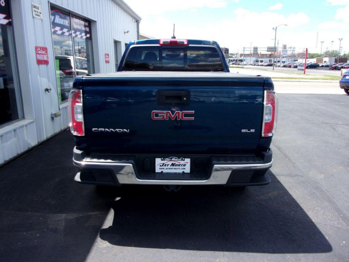 2019 BLUE GMC CANYON SLE (1GTH5CEA8K1) with an 2.5L engine, Automatic transmission, located at 501 E. Columbia St., Springfield, OH, 45503, (800) 262-7122, 39.925262, -83.801796 - ***Clean Carfax***SLE***Heated Seats***Back-up Camera***Rear Sensors***Bed Cover***Serviced and Detailed*** Jay North Auto has offered hand picked vehicles since 1965! Our customer's enjoy a NO pressure buying experience with a small town feel. All of our vehicles get fully inspected and detaile - Photo#4