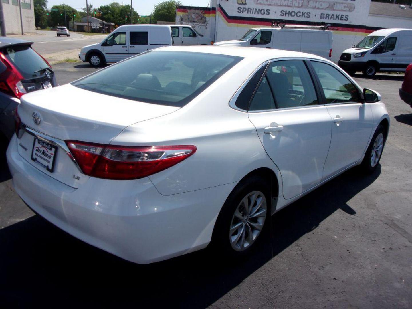 2017 WHITE TOYOTA CAMRY LE (4T1BF1FK1HU) with an 2.5L engine, Automatic transmission, located at 501 E. Columbia St., Springfield, OH, 45503, (800) 262-7122, 39.925262, -83.801796 - Photo#4