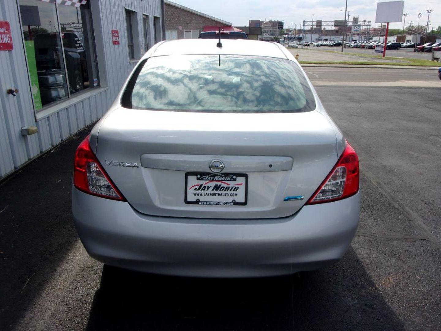 2012 SILVER NISSAN VERSA S (3N1CN7AP7CL) with an 1.6L engine, 5-Speed Manual transmission, located at 501 E. Columbia St., Springfield, OH, 45503, (800) 262-7122, 39.925262, -83.801796 - *** 1 Owner w/ good serviced history *** 5 Speed Manual *** Great MPG *** Serviced and Detailed *** Ice Cold A/C *** Jay North Auto has offered hand picked vehicles since 1965! Our customer's enjoy a NO pressure buying experience with a small town feel. All of our vehicles get fully inspected an - Photo#5