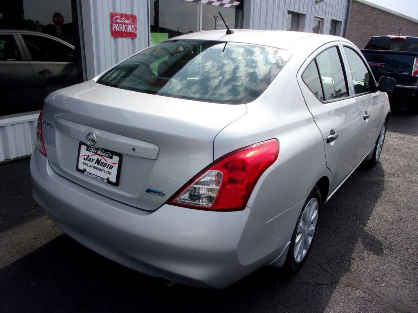 2012 SILVER NISSAN VERSA S (3N1CN7AP7CL) with an 1.6L engine, 5-Speed Manual transmission, located at 501 E. Columbia St., Springfield, OH, 45503, (800) 262-7122, 39.925262, -83.801796 - *** 1 Owner w/ good serviced history *** 5 Speed Manual *** Great MPG *** Serviced and Detailed *** Ice Cold A/C *** Jay North Auto has offered hand picked vehicles since 1965! Our customer's enjoy a NO pressure buying experience with a small town feel. All of our vehicles get fully inspected an - Photo#6