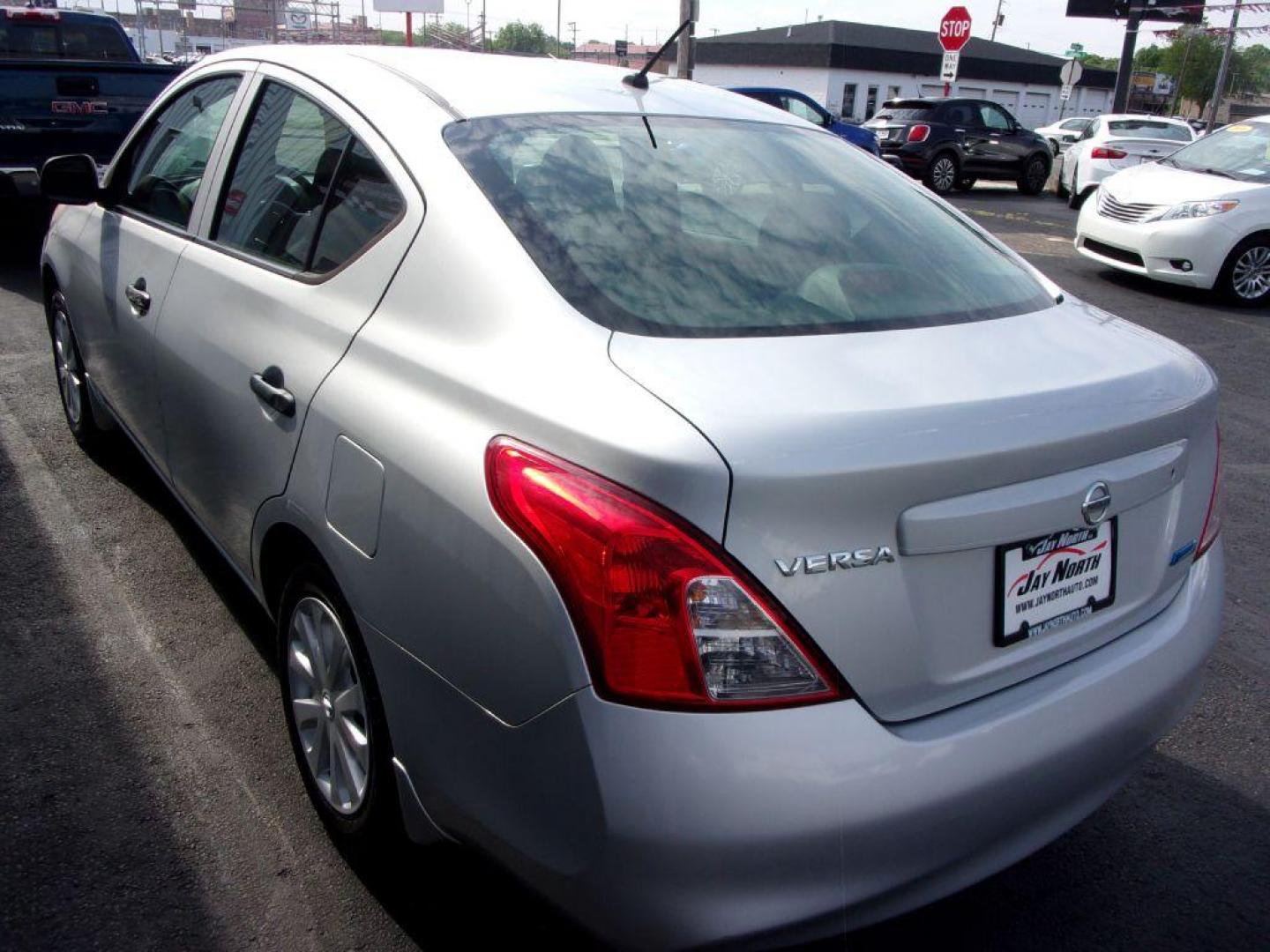 2012 SILVER NISSAN VERSA S (3N1CN7AP7CL) with an 1.6L engine, 5-Speed Manual transmission, located at 501 E. Columbia St., Springfield, OH, 45503, (800) 262-7122, 39.925262, -83.801796 - *** 1 Owner w/ good serviced history *** 5 Speed Manual *** Great MPG *** Serviced and Detailed *** Ice Cold A/C *** Jay North Auto has offered hand picked vehicles since 1965! Our customer's enjoy a NO pressure buying experience with a small town feel. All of our vehicles get fully inspected an - Photo#7