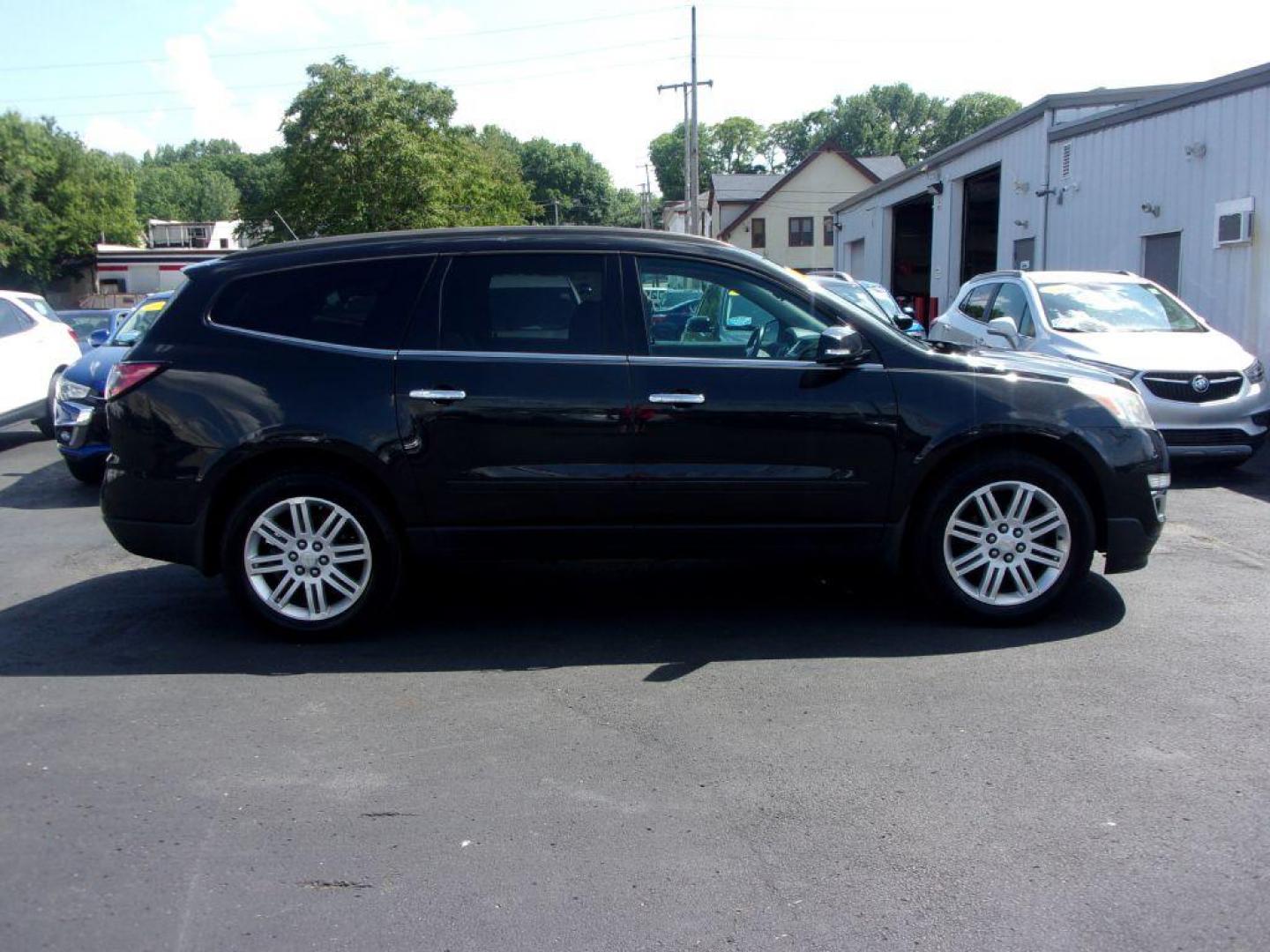 2014 BLACK CHEVROLET TRAVERSE LT (1GNKVGKD2EJ) with an 3.6L engine, Automatic transmission, located at 501 E. Columbia St., Springfield, OH, 45503, (800) 262-7122, 39.925262, -83.801796 - *** Serviced and Detailed *** LT *** AWD *** Jay North Auto has offered hand picked vehicles since 1965! Our customer's enjoy a NO pressure buying experience with a small town feel. All of our vehicles get fully inspected and detailed. We are a preferred dealer for many local credit unions and - Photo#0