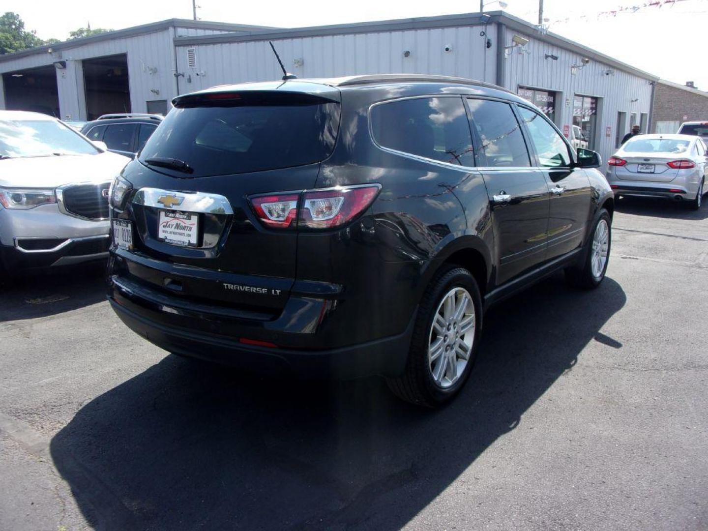 2014 BLACK CHEVROLET TRAVERSE LT (1GNKVGKD2EJ) with an 3.6L engine, Automatic transmission, located at 501 E. Columbia St., Springfield, OH, 45503, (800) 262-7122, 39.925262, -83.801796 - *** Serviced and Detailed *** LT *** AWD *** Jay North Auto has offered hand picked vehicles since 1965! Our customer's enjoy a NO pressure buying experience with a small town feel. All of our vehicles get fully inspected and detailed. We are a preferred dealer for many local credit unions and - Photo#3