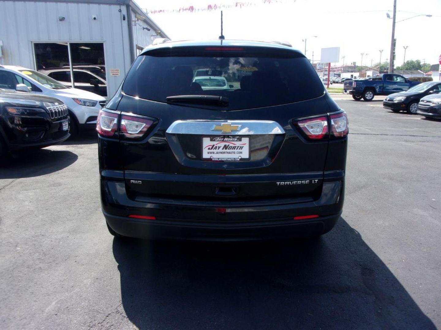 2014 BLACK CHEVROLET TRAVERSE LT (1GNKVGKD2EJ) with an 3.6L engine, Automatic transmission, located at 501 E. Columbia St., Springfield, OH, 45503, (800) 262-7122, 39.925262, -83.801796 - *** Serviced and Detailed *** LT *** AWD *** Jay North Auto has offered hand picked vehicles since 1965! Our customer's enjoy a NO pressure buying experience with a small town feel. All of our vehicles get fully inspected and detailed. We are a preferred dealer for many local credit unions and - Photo#4