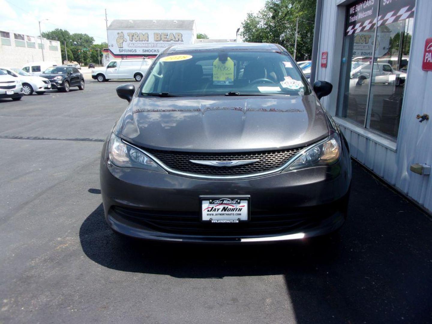 2018 GRAY CHRYSLER PACIFICA LX (2C4RC1CG6JR) with an 3.6L engine, Automatic transmission, located at 501 E. Columbia St., Springfield, OH, 45503, (800) 262-7122, 39.925262, -83.801796 - *** 1 Owner w/ Clean CarFax *** LX *** V6 *** CHRYSLER PACIFICA LX Exterior Color: Granite Crystal Metallic Clear Coat Exterior Paint Interior Color: Black / Alloy Interior Colors Interior: Cloth Bucket Seats Engine: 3.6L V6 24V VVT Engine with ESS Transmission: 9-Speed FWD Automatic Transmission - Photo#1