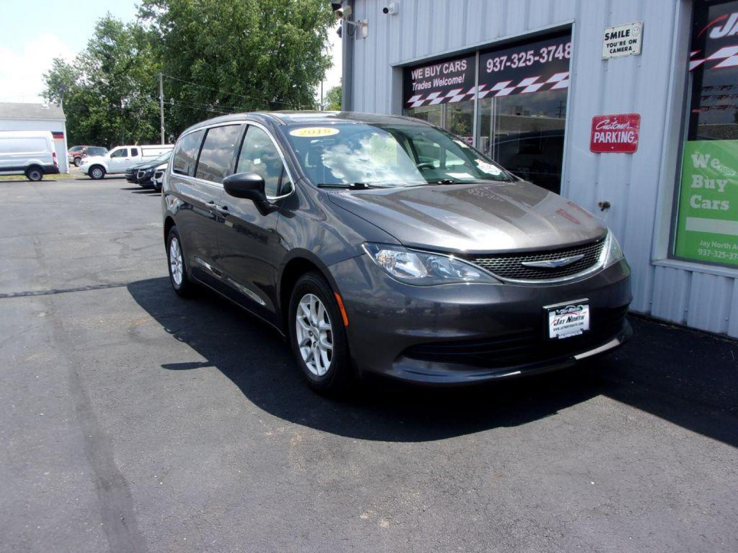 2018 GRAY CHRYSLER PACIFICA LX (2C4RC1CG6JR) with an 3.6L engine, Automatic transmission, located at 501 E. Columbia St., Springfield, OH, 45503, (800) 262-7122, 39.925262, -83.801796 - *** 1 Owner w/ Clean CarFax *** LX *** V6 *** CHRYSLER PACIFICA LX Exterior Color: Granite Crystal Metallic Clear Coat Exterior Paint Interior Color: Black / Alloy Interior Colors Interior: Cloth Bucket Seats Engine: 3.6L V6 24V VVT Engine with ESS Transmission: 9-Speed FWD Automatic Transmission - Photo#2