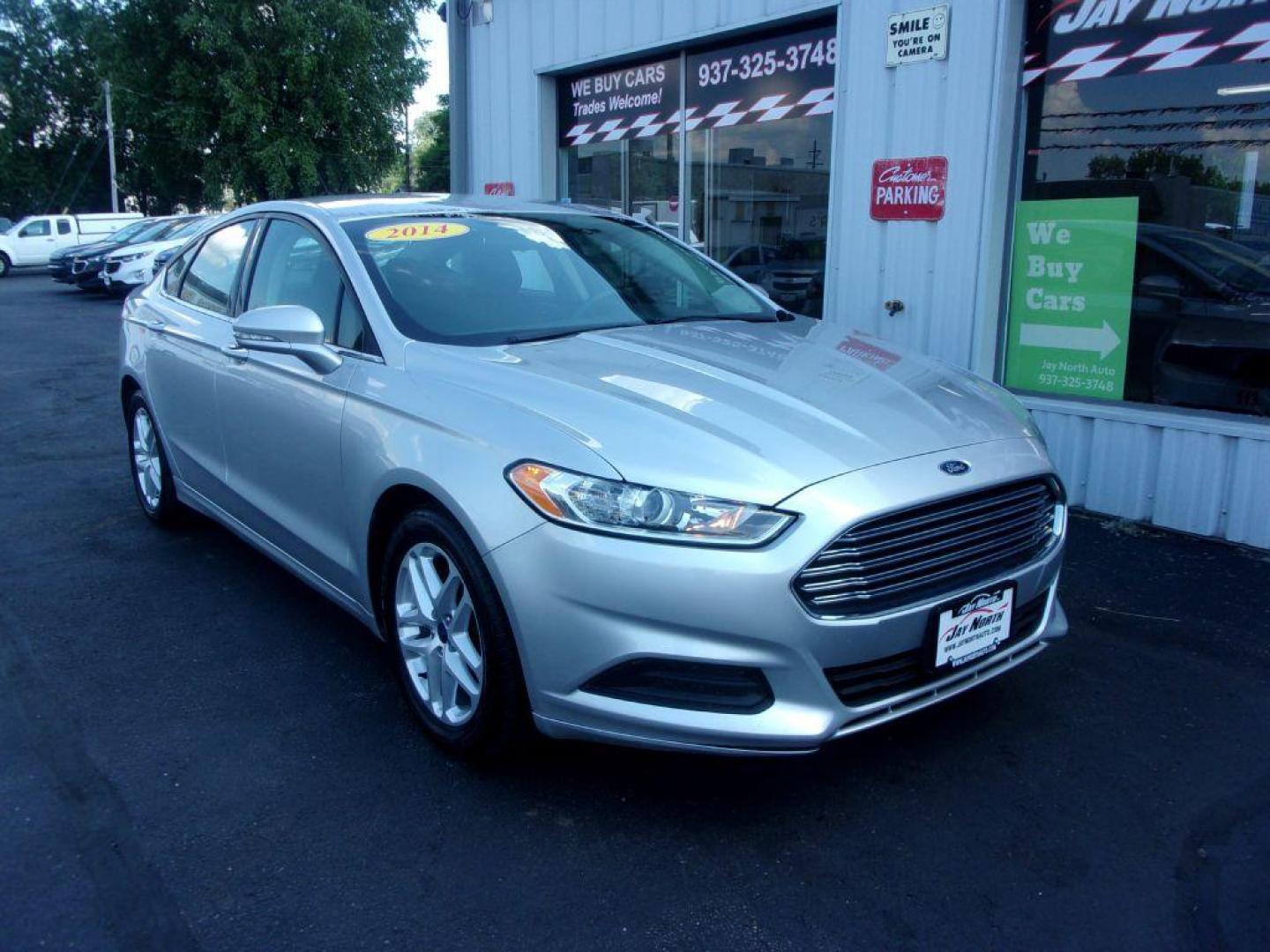 2014 SILVER FORD FUSION SE (3FA6P0H79ER) with an 2.5L engine, Automatic transmission, located at 501 E. Columbia St., Springfield, OH, 45503, (800) 262-7122, 39.925262, -83.801796 - *** New Tires *** Serviced and Detailed *** SE *** FWD *** Low Miles *** Clean CarFax *** Jay North Auto has offered hand picked vehicles since 1965! Our customer's enjoy a NO pressure buying experience with a small town feel. All of our vehicles get fully inspected and detailed. We are a prefe - Photo#2