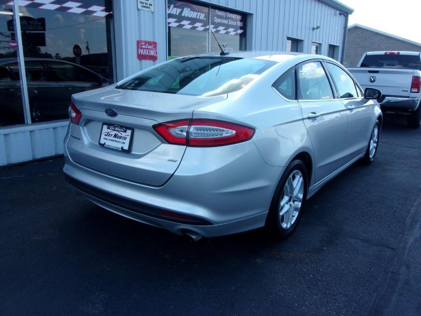 2014 SILVER FORD FUSION SE (3FA6P0H79ER) with an 2.5L engine, Automatic transmission, located at 501 E. Columbia St., Springfield, OH, 45503, (800) 262-7122, 39.925262, -83.801796 - *** New Tires *** Serviced and Detailed *** SE *** FWD *** Low Miles *** Clean CarFax *** Jay North Auto has offered hand picked vehicles since 1965! Our customer's enjoy a NO pressure buying experience with a small town feel. All of our vehicles get fully inspected and detailed. We are a prefe - Photo#3