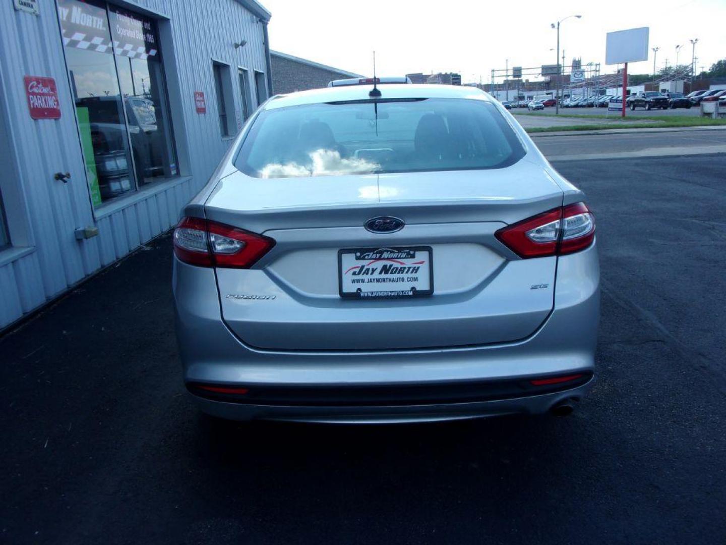 2014 SILVER FORD FUSION SE (3FA6P0H79ER) with an 2.5L engine, Automatic transmission, located at 501 E. Columbia St., Springfield, OH, 45503, (800) 262-7122, 39.925262, -83.801796 - *** New Tires *** Serviced and Detailed *** SE *** FWD *** Low Miles *** Clean CarFax *** Jay North Auto has offered hand picked vehicles since 1965! Our customer's enjoy a NO pressure buying experience with a small town feel. All of our vehicles get fully inspected and detailed. We are a prefe - Photo#4