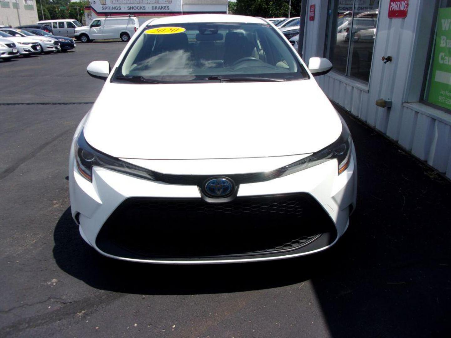 2020 WHITE TOYOTA COROLLA LE HYBRID (JTDEBRBE3LJ) with an 1.8L engine, Continuously Variable transmission, located at 501 E. Columbia St., Springfield, OH, 45503, (800) 262-7122, 39.925262, -83.801796 - Photo#1