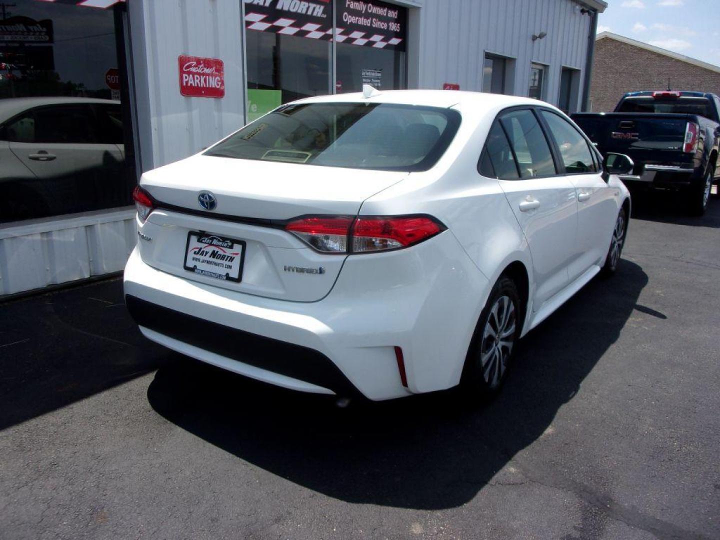 2020 WHITE TOYOTA COROLLA LE HYBRID (JTDEBRBE3LJ) with an 1.8L engine, Continuously Variable transmission, located at 501 E. Columbia St., Springfield, OH, 45503, (800) 262-7122, 39.925262, -83.801796 - Photo#3